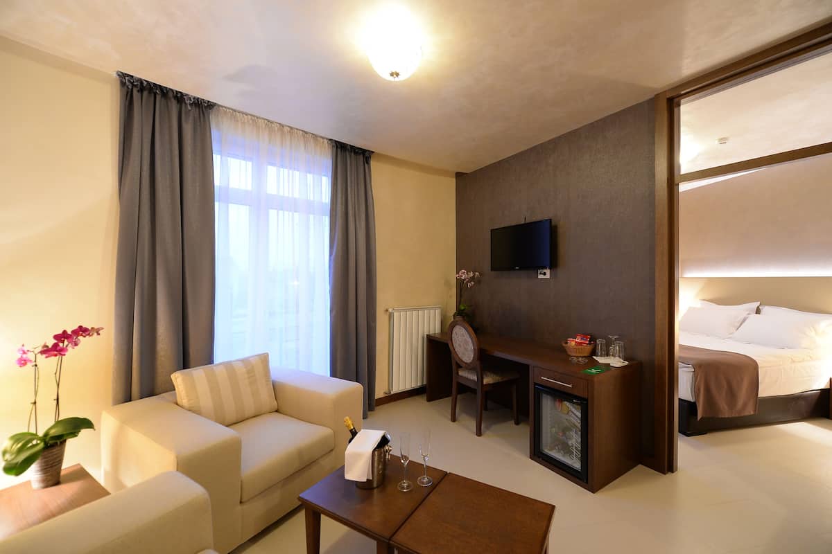 Junior Apartment, 2 Bedrooms | Living area | LED TV