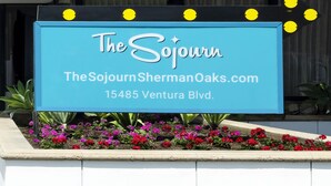 A sign for The Sojourn at 15485 Ventura Blvd. - The Sojourn Los Angeles - Sherman Oaks (Sherman Oaks)