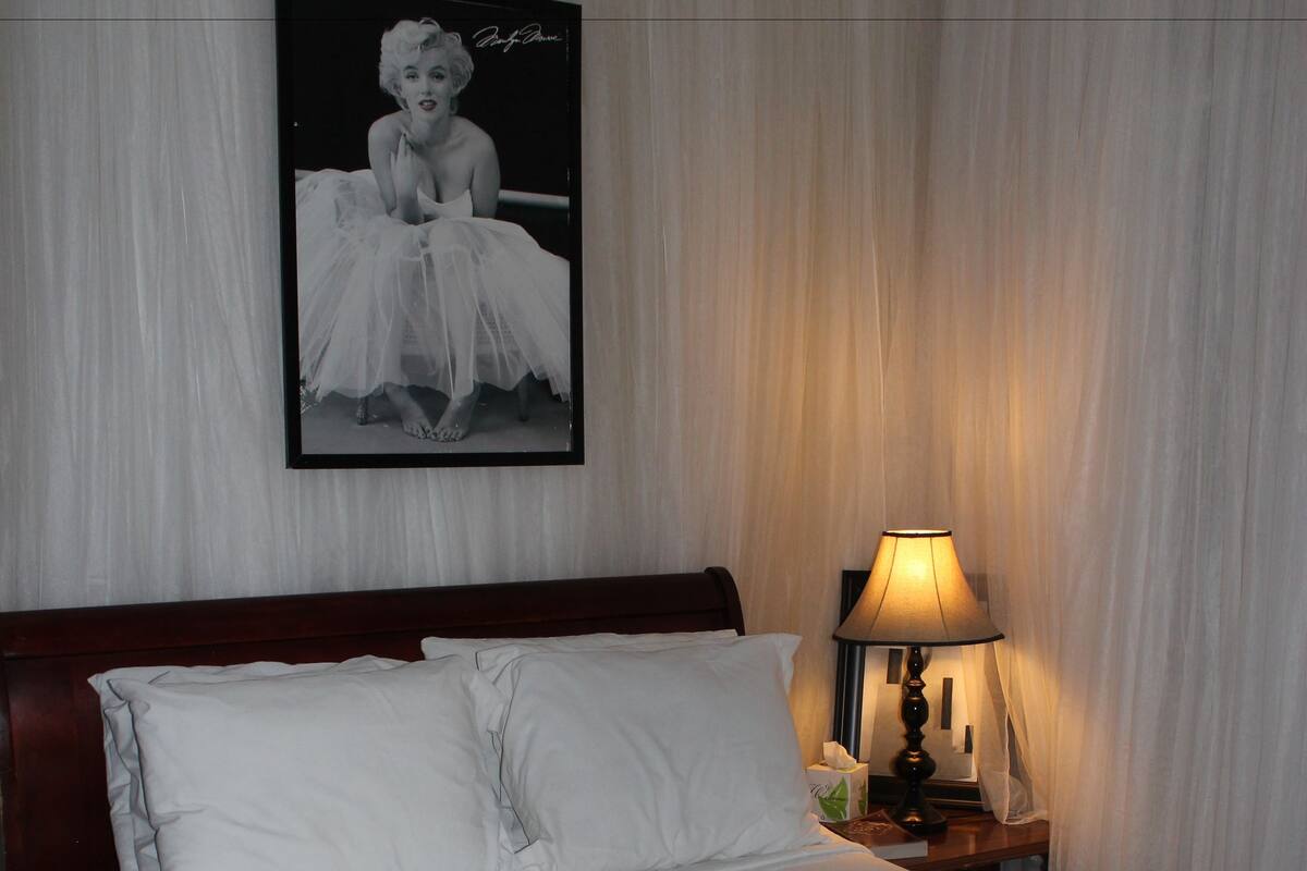 Individually decorated, individually furnished, desk, rollaway beds