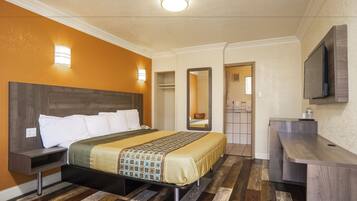 Quarto standard, 1 cama King, para não fumantes | Escrivaninha, ferros/tábuas de passar roupa, Wi-Fi de cortesia