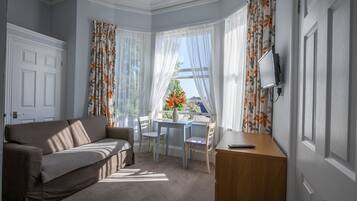 Laptop workspace, iron/ironing board, free cots/infant beds