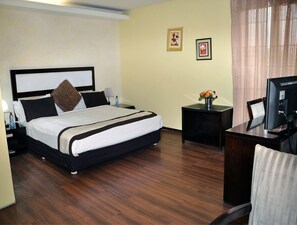 Deluxe Double Room Single Use | Down comforters, Tempur-Pedic beds, minibar, individually decorated