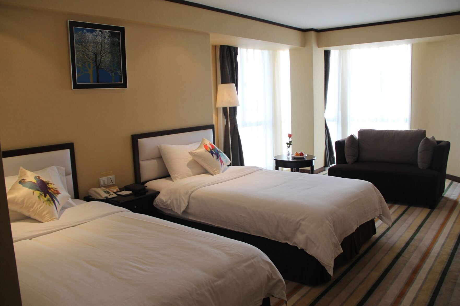 Premium bedding, pillow-top beds, minibar, in-room safe