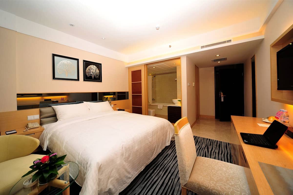 고급 침구, 필로우탑 침대, 미니바, 객실 내 금고