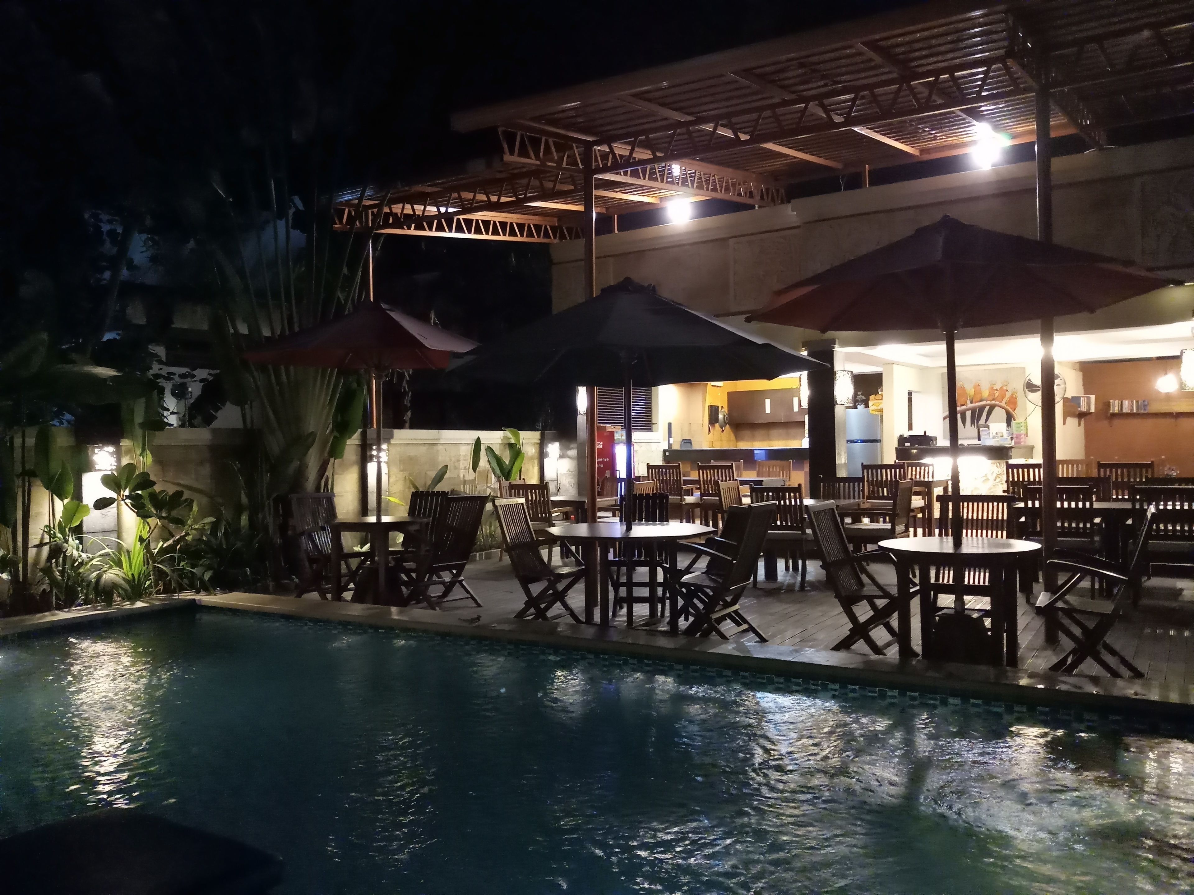 Outdoor pool, open 7:00 AM to 9:00 PM, pool umbrellas, pool loungers