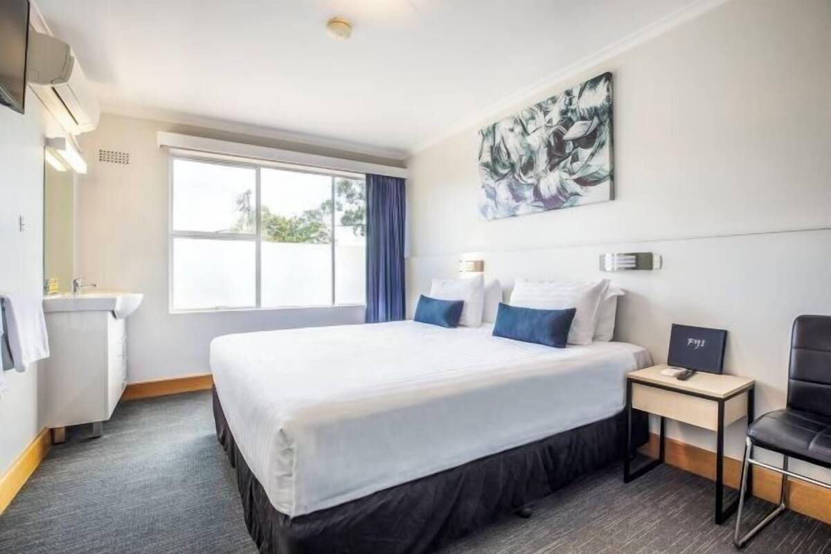 Desk, blackout drapes, iron/ironing board, WiFi (free)