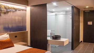 Shower, free toiletries, hair dryer, towels