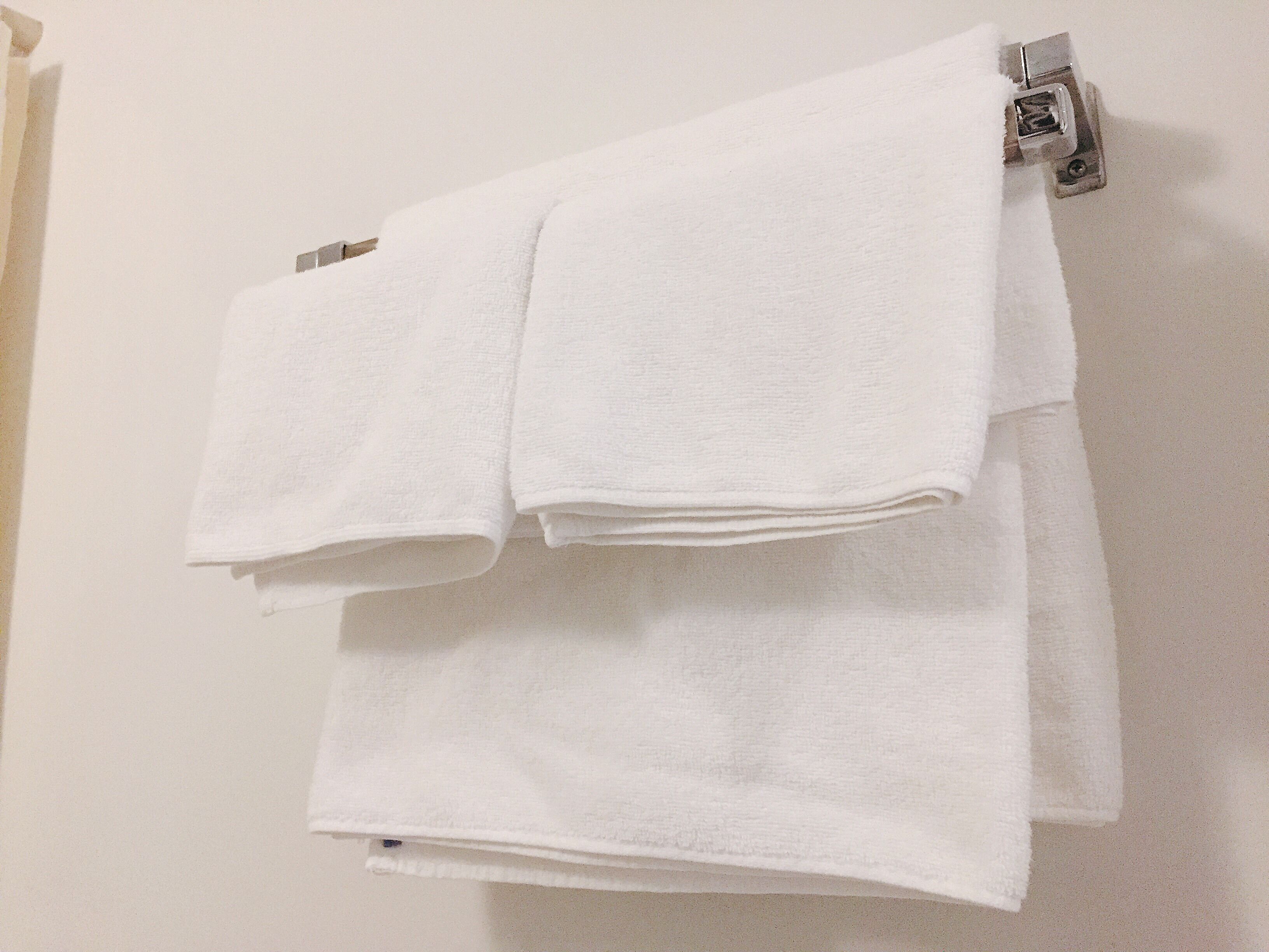 hair dryer, slippers, electronic bidet, towels