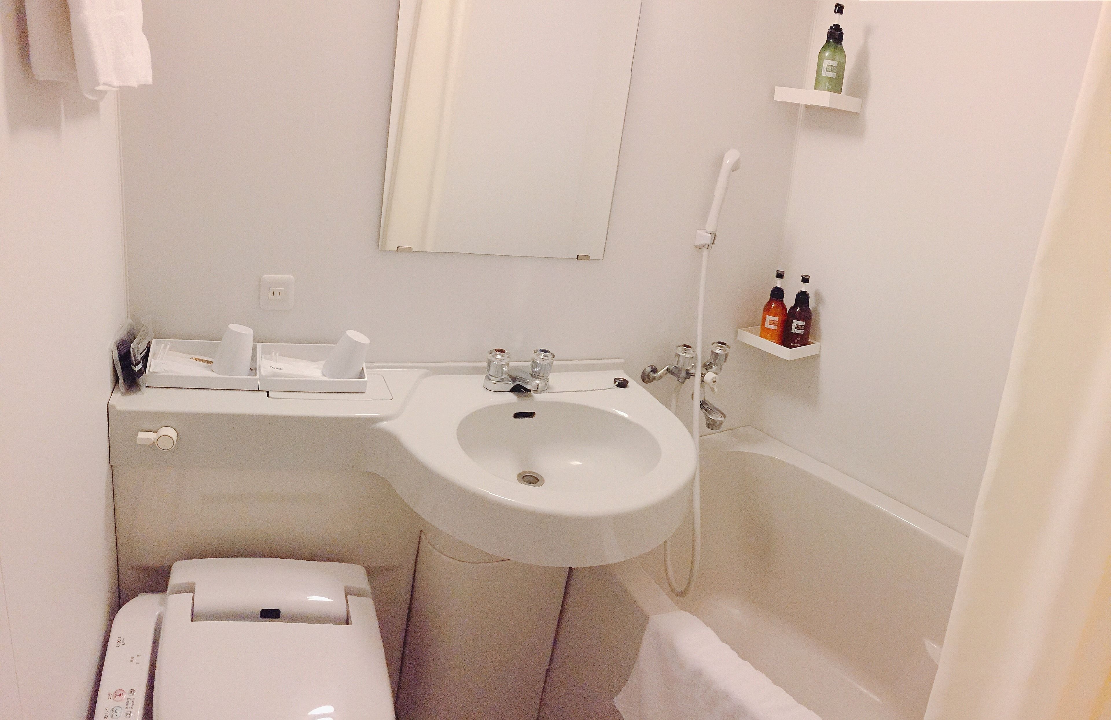 twin room, non smoking | bathroom amenities | hair dryer, slippers, electronic bidet, towels