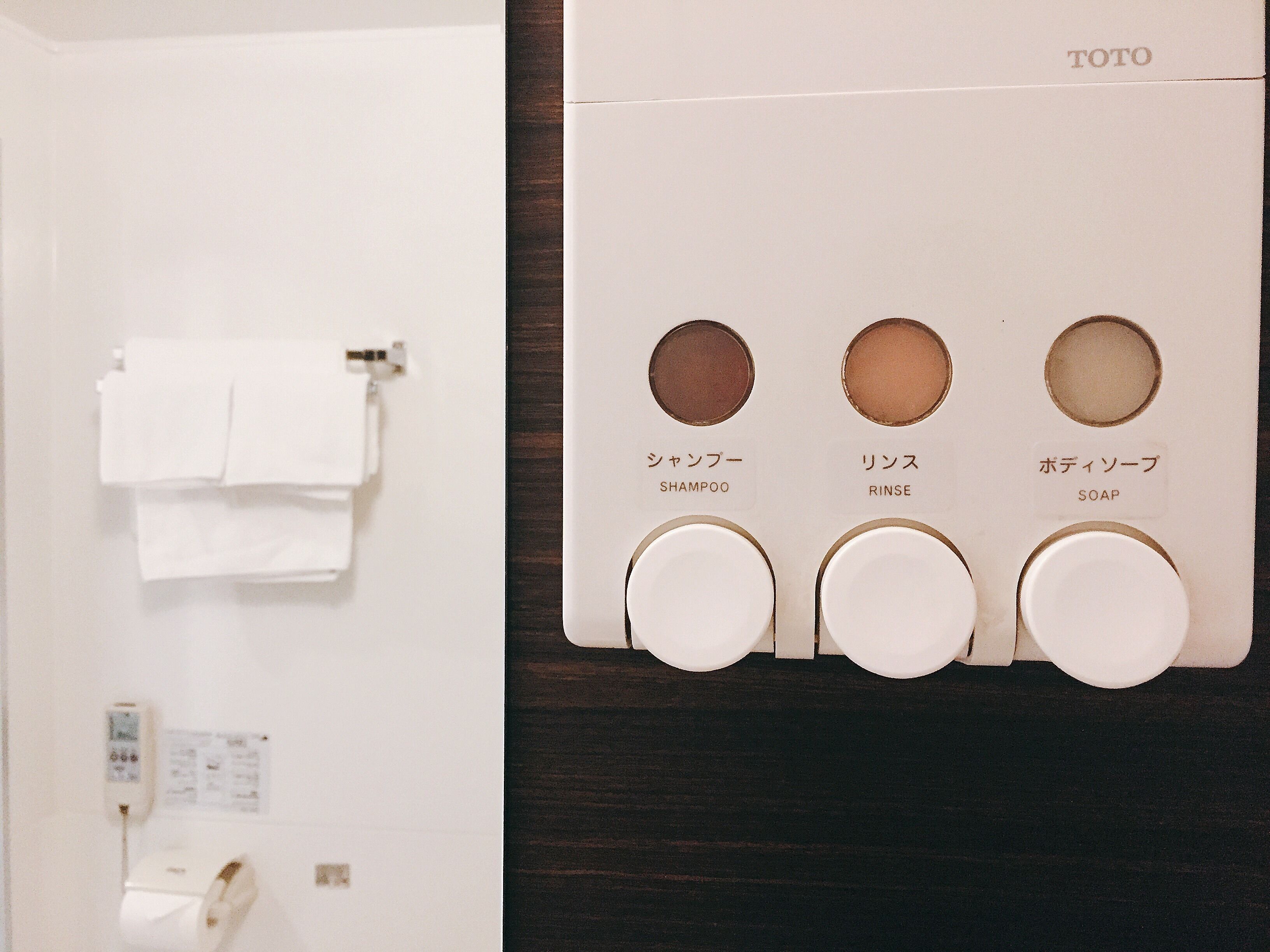 hair dryer, slippers, electronic bidet, towels