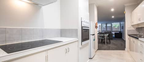 Two Bedroom Apartment | Private kitchen | Fridge, electric kettle