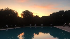 A swimming pool with lounge chairs and trees in the background. - Residence Altair-Serra Alimini 3 (Otranto)
