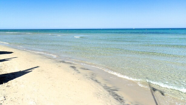 A beach with clear water and a sandy shore. - Residence Altair-Serra Alimini 3 (Otranto)