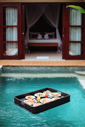 Outdoor pool, pool umbrellas, pool loungers