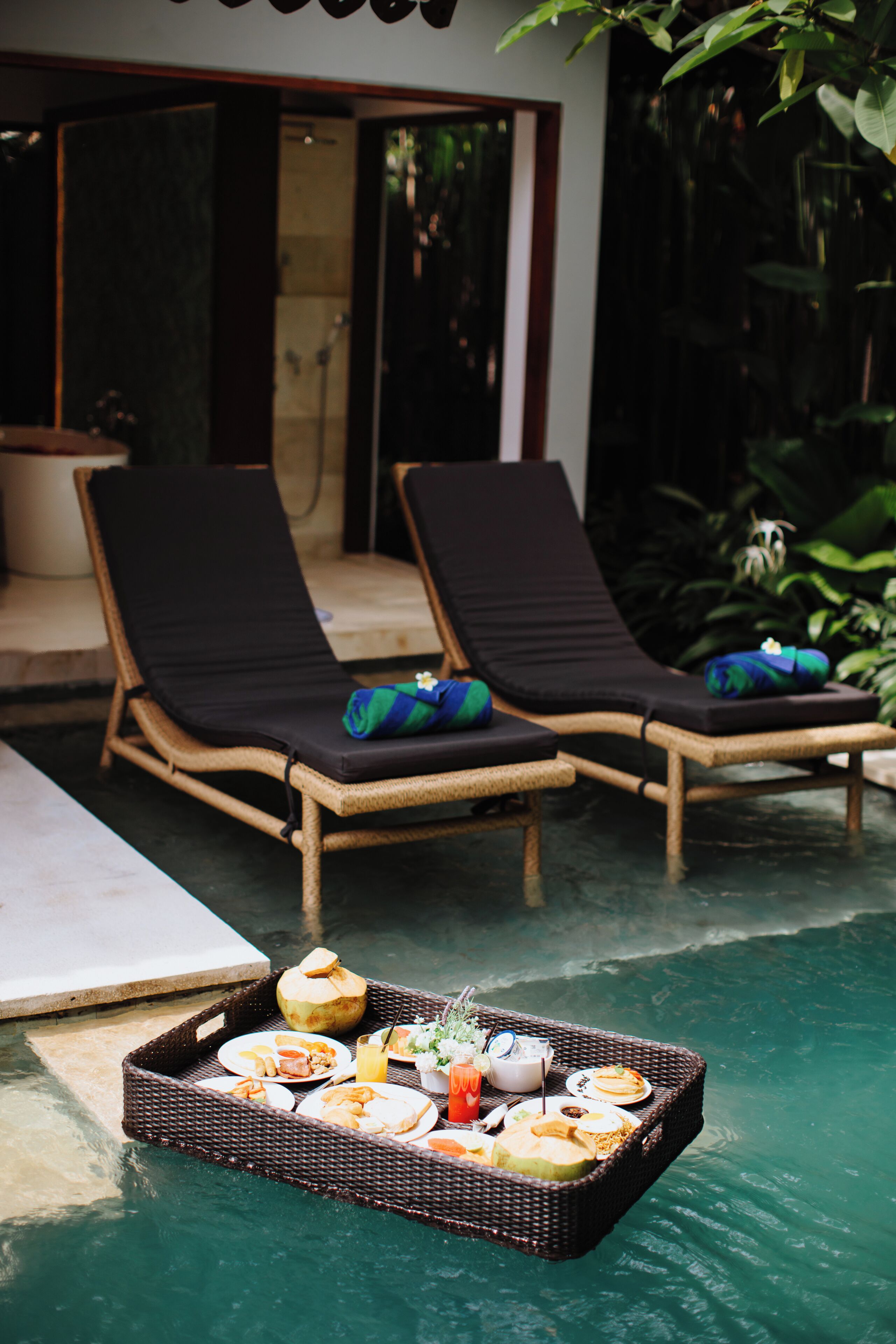 Outdoor pool, pool umbrellas, sun loungers