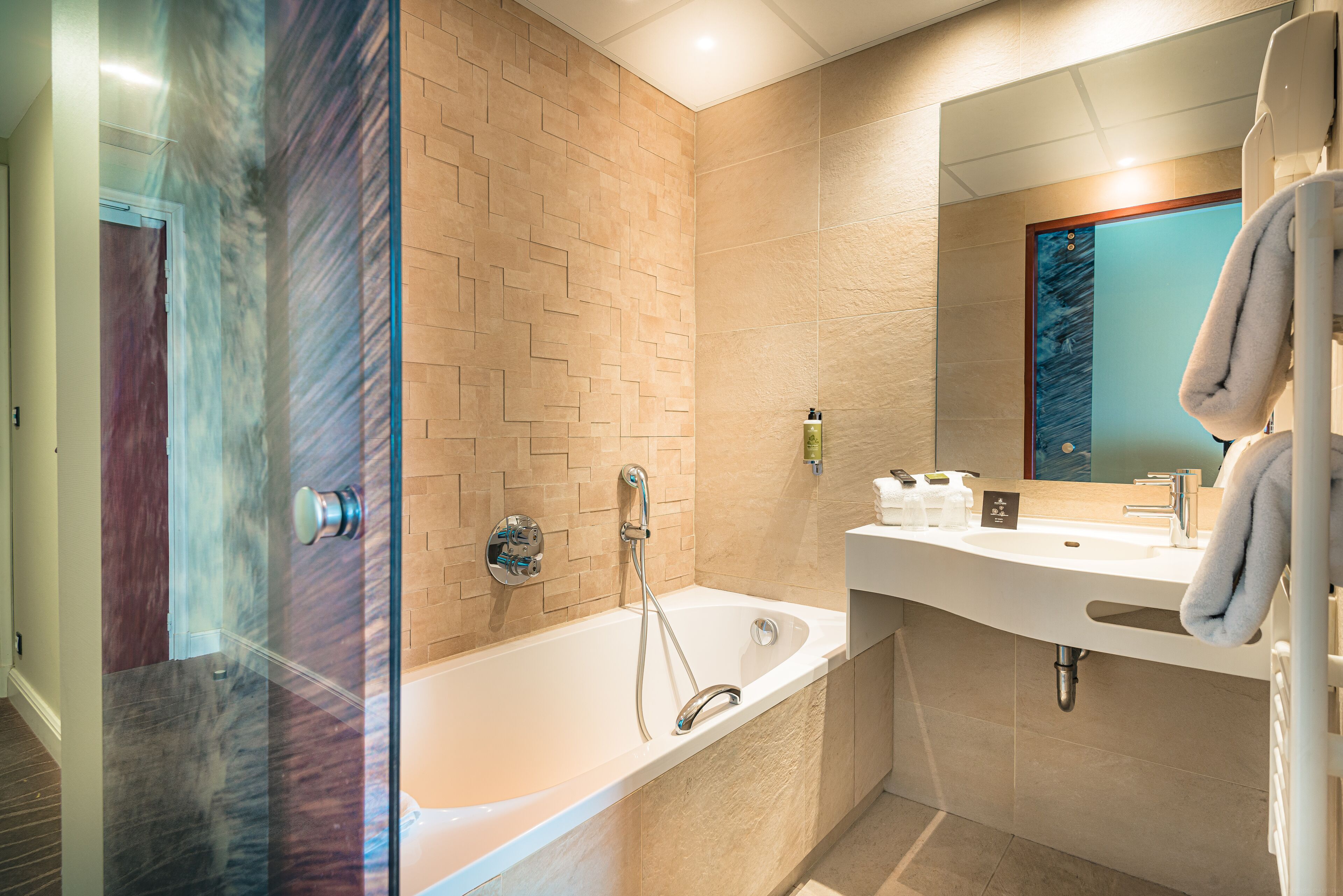 superior sea view room | bathroom | hair dryer, towels