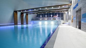 Indoor pool, outdoor pool, open 10:00 AM to 8:00 PM, pool umbrellas