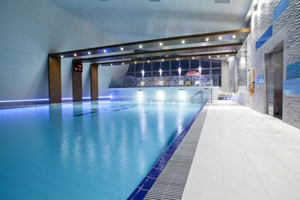 Indoor pool, outdoor pool, open 10:00 AM to 8:00 PM, pool umbrellas