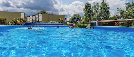 Indoor pool, outdoor pool, open 10:00 AM to 8:00 PM, pool umbrellas