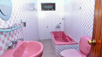 Standard Double Room, Courtyard View | Bathroom | Shower, hair dryer, slippers, towels