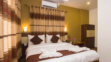 Deluxe Room Non AC | 15 bedrooms, in-room safe, individually decorated