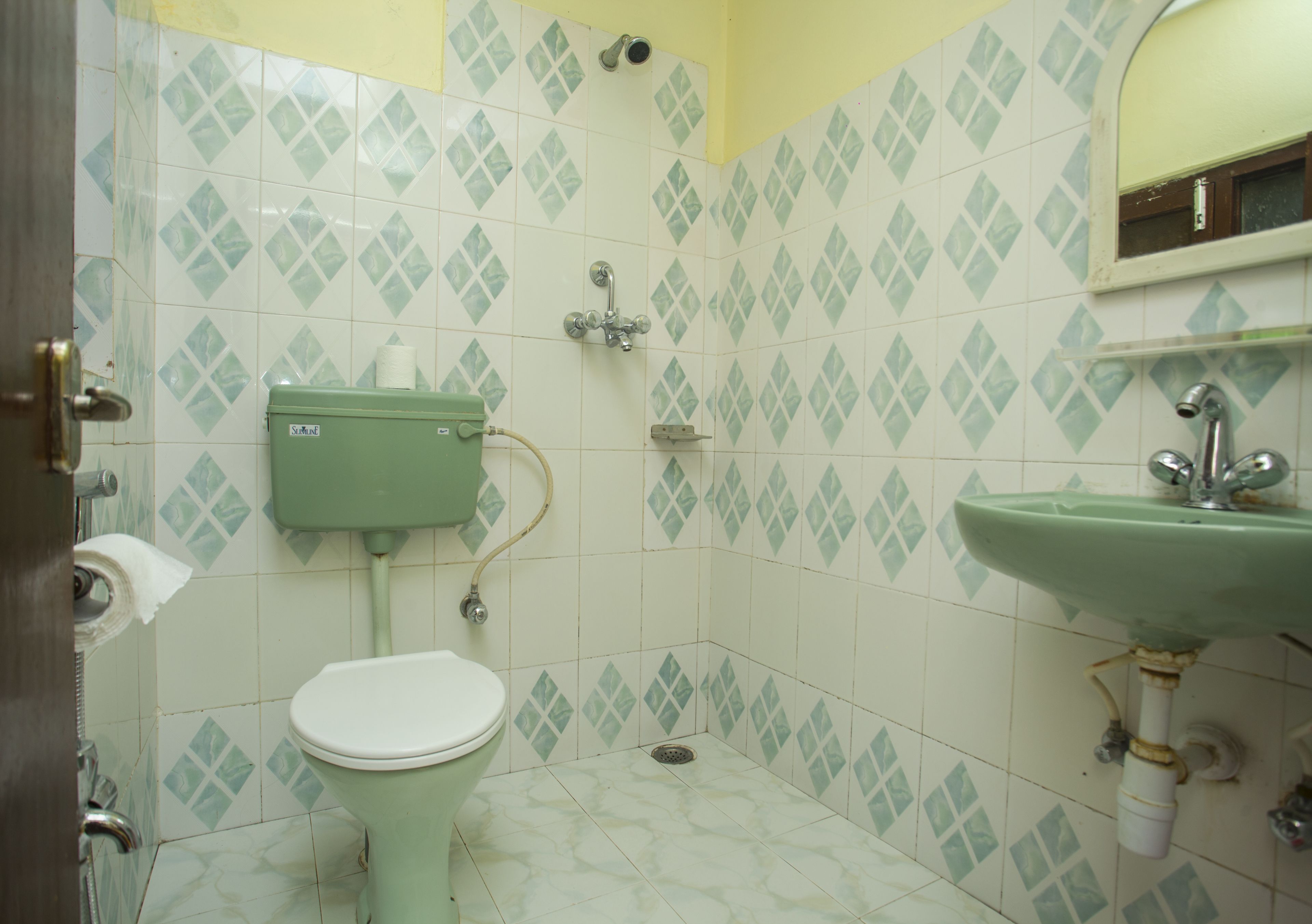 family room non ac | bathroom | bathrobes, slippers, bidet, towels