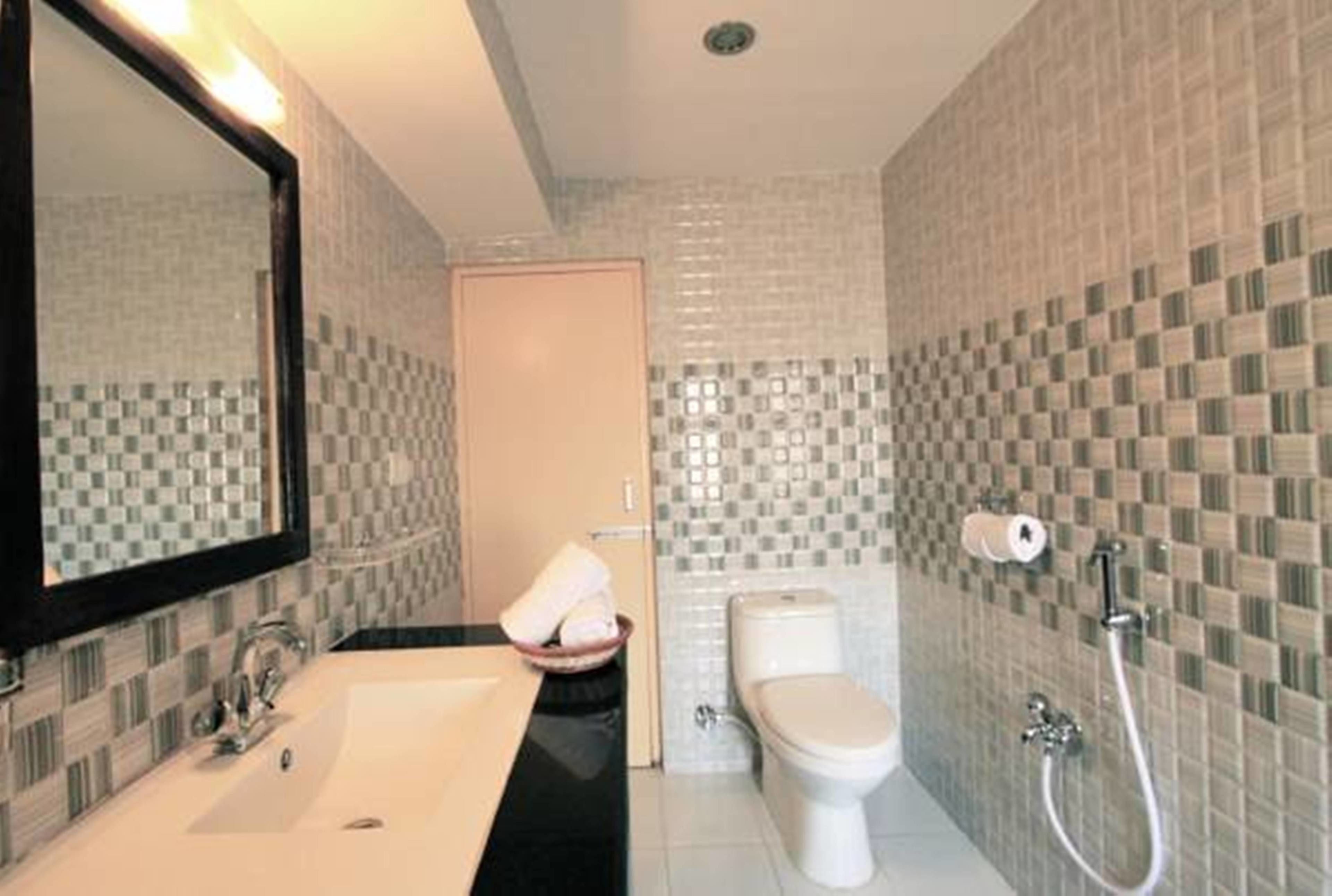 bathrobes, slippers, bidet, towels