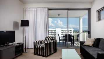 Apartment, 1 Bedroom | Living area | 40-inch flat-screen TV with digital channels, TV