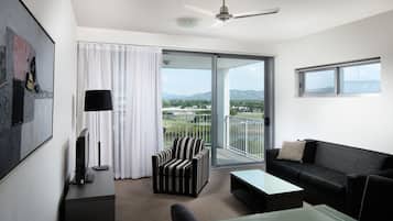 Apartment, 1 Bedroom | Living area | 40-inch flat-screen TV with digital channels, TV