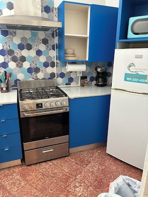 Apartamento design, 1 cama King | 1 quarto, roupas de cama premium, cofres nos quartos