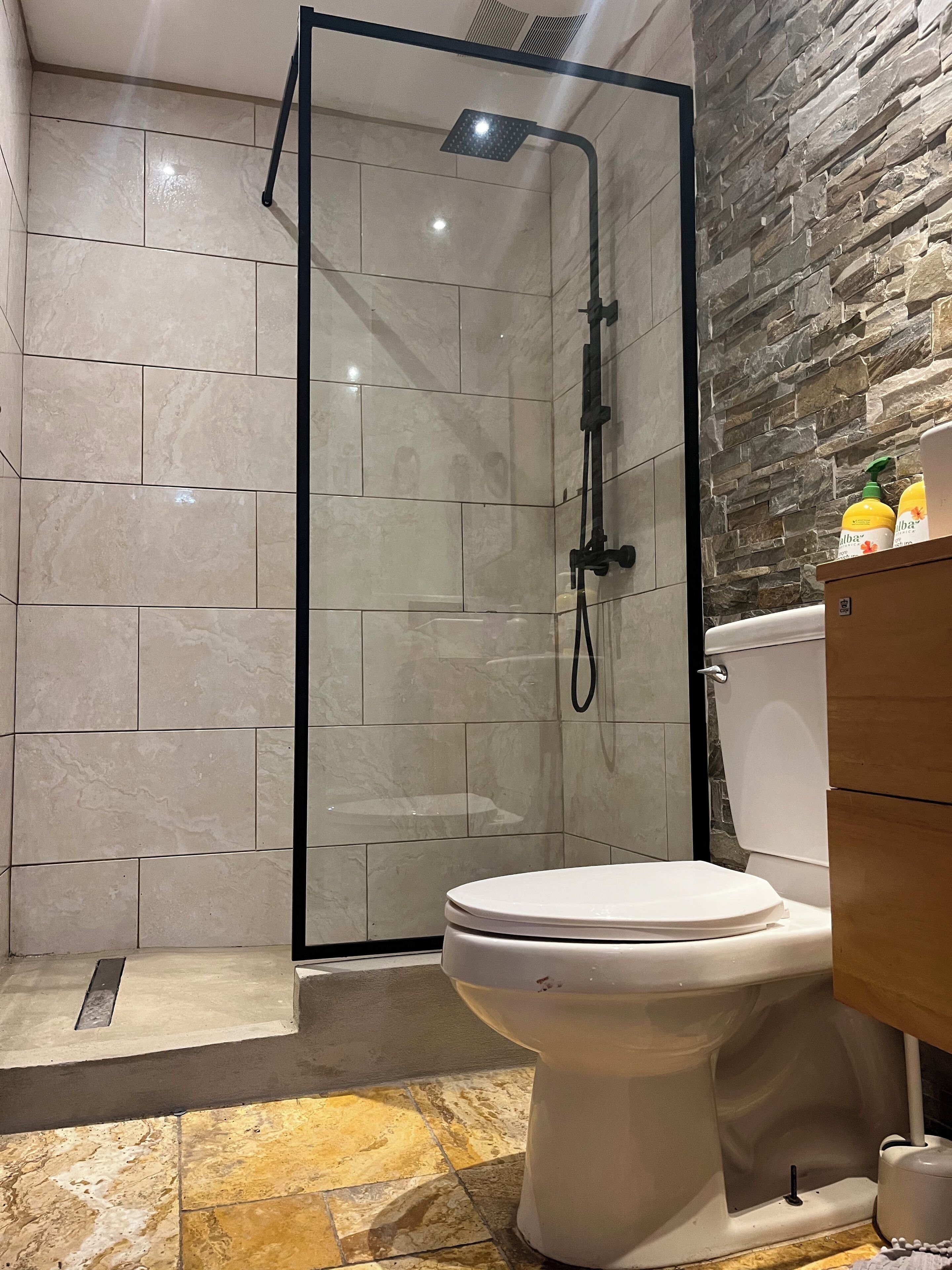 Comfort Room, 1 King Bed | Bathroom | Shower, free toiletries, hair dryer, bidet