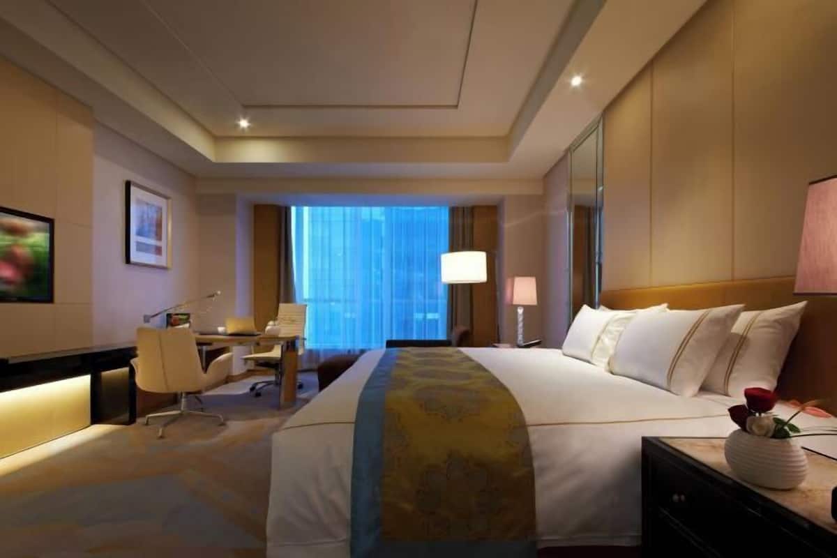 Down comforters, pillowtop beds, minibar, desk