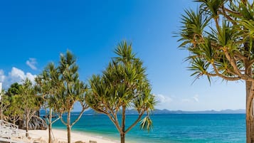 On the beach, white sand