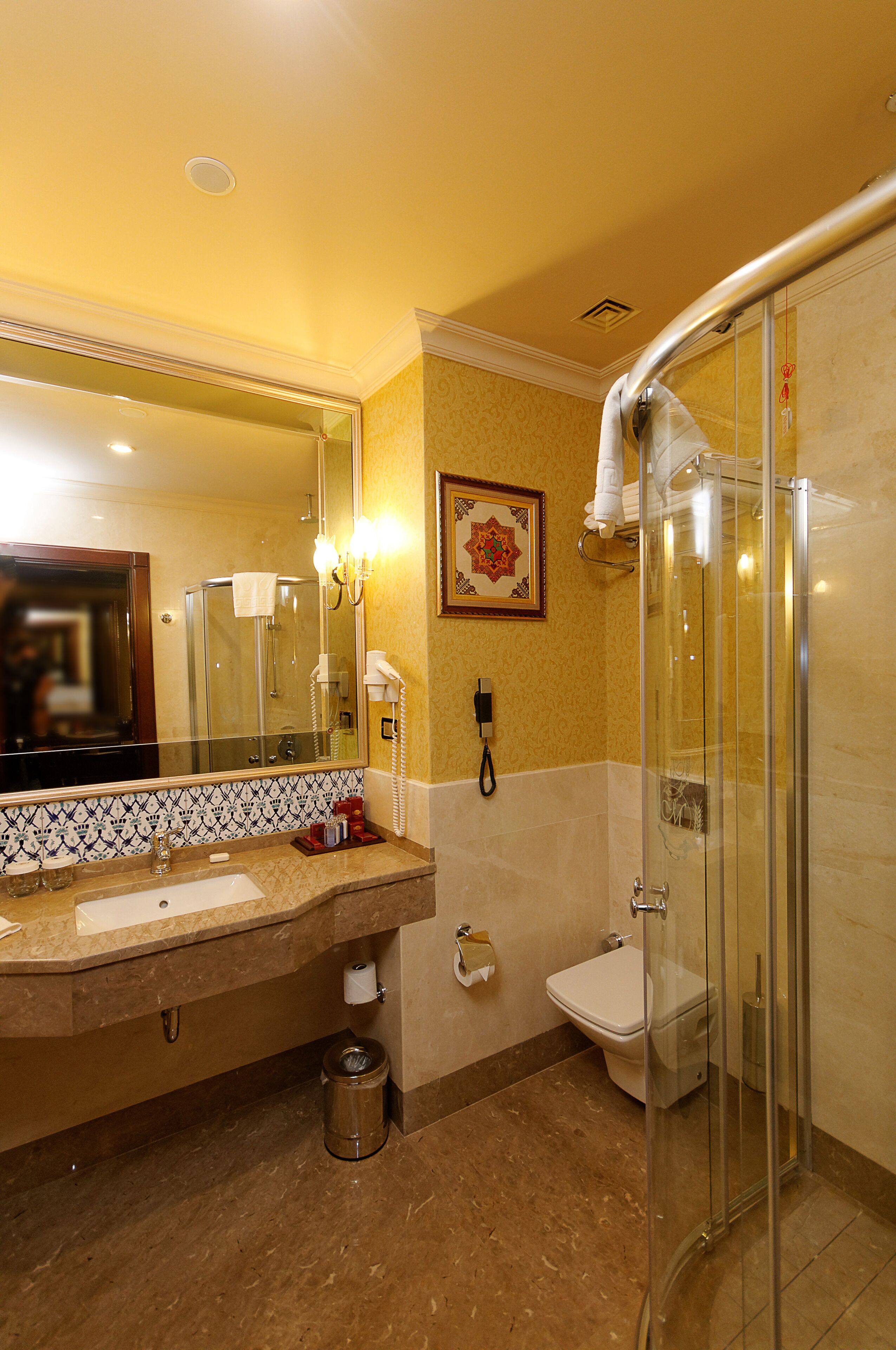 separate bathtub and shower, hair dryer, bathrobes, slippers