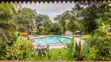 Outdoor pool, open 9:30 AM to 5:30 PM, pool loungers