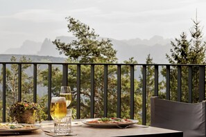 Dinner, brunch served; local cuisine, alfresco dining 