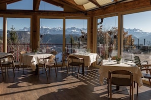 Dinner, brunch served; local cuisine, al fresco dining