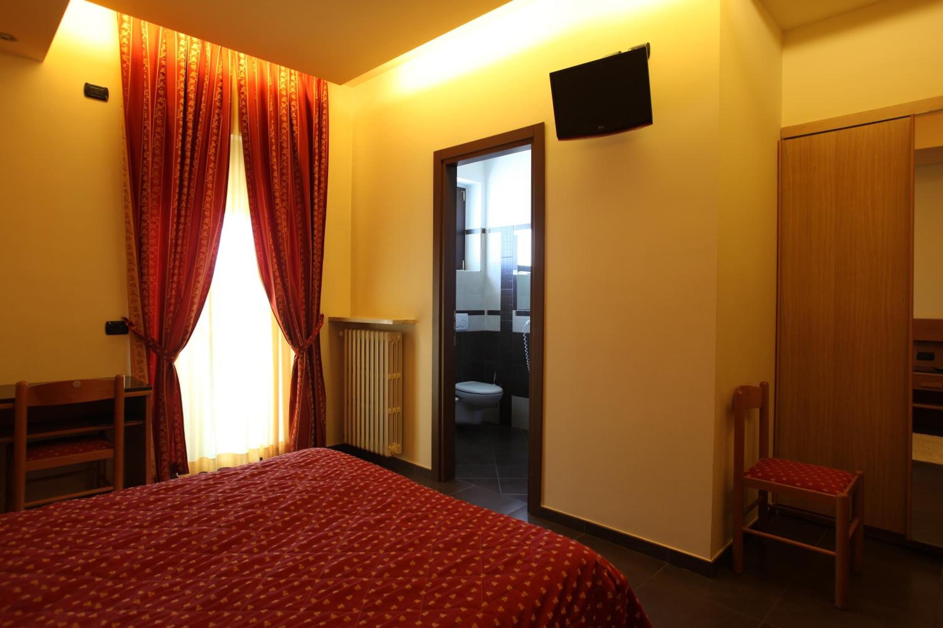 in-room safe, desk, blackout curtains, rollaway beds