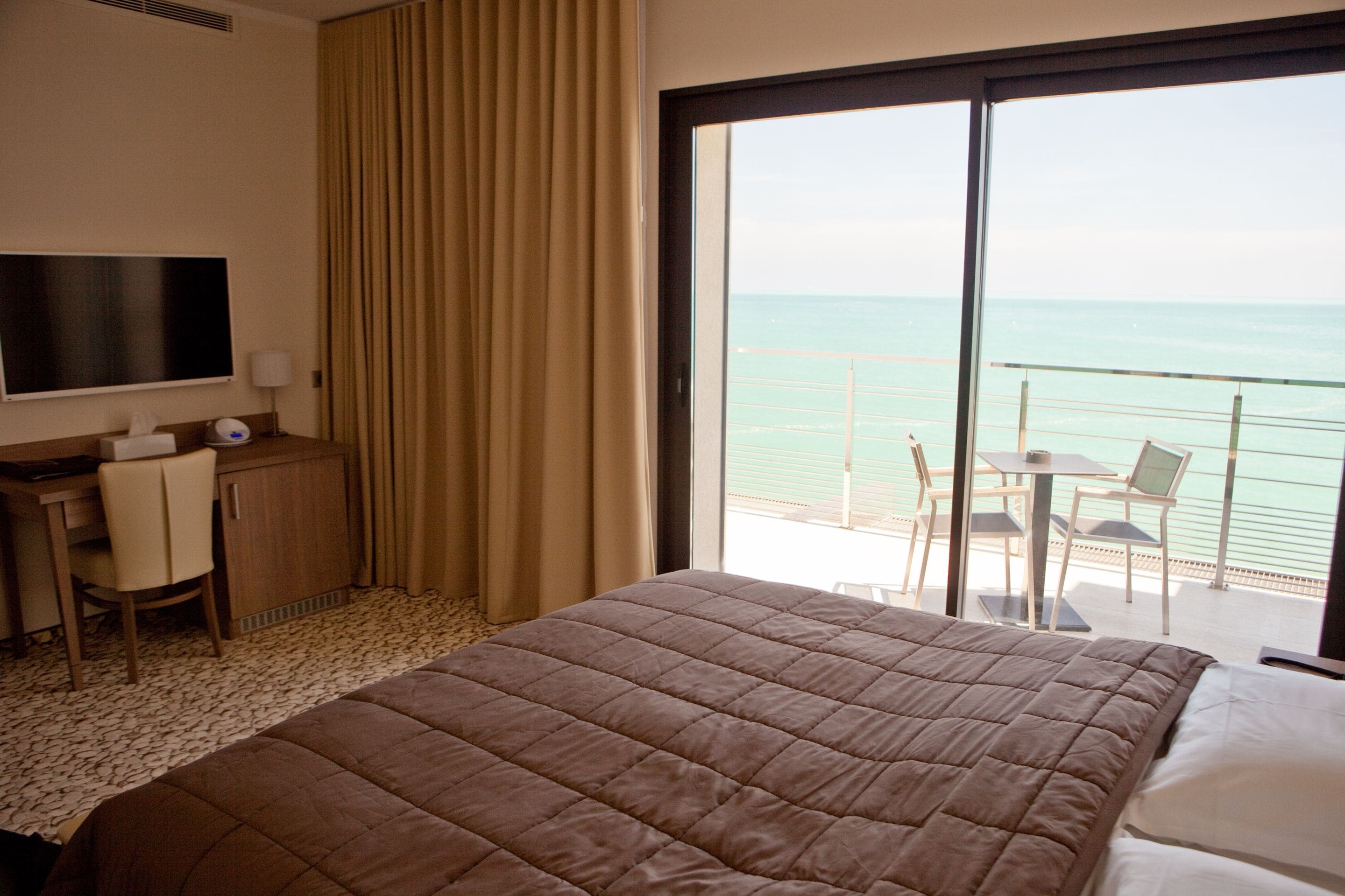 classic double room, sea view | premium bedding, minibar, in-room safe, desk