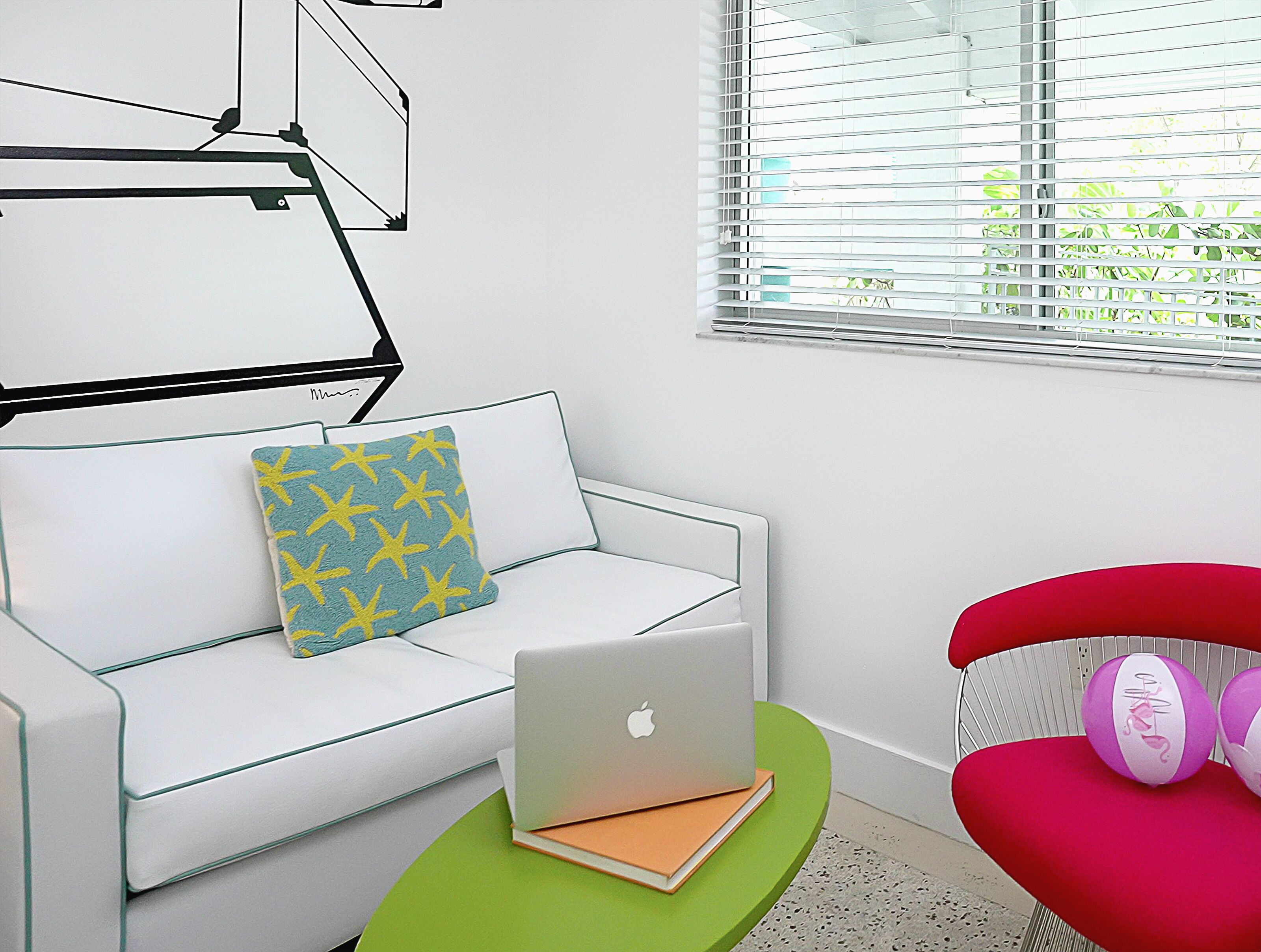 deluxe double room single use | living area | 40-inch smart tv with cable channels, netflix, ipod dock