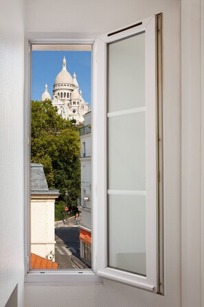 1 bedroom, laptop workspace, blackout drapes, iron/ironing board