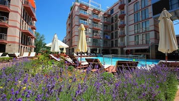 2 outdoor pools, pool umbrellas, pool loungers