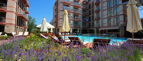 2 outdoor pools, pool umbrellas, pool loungers