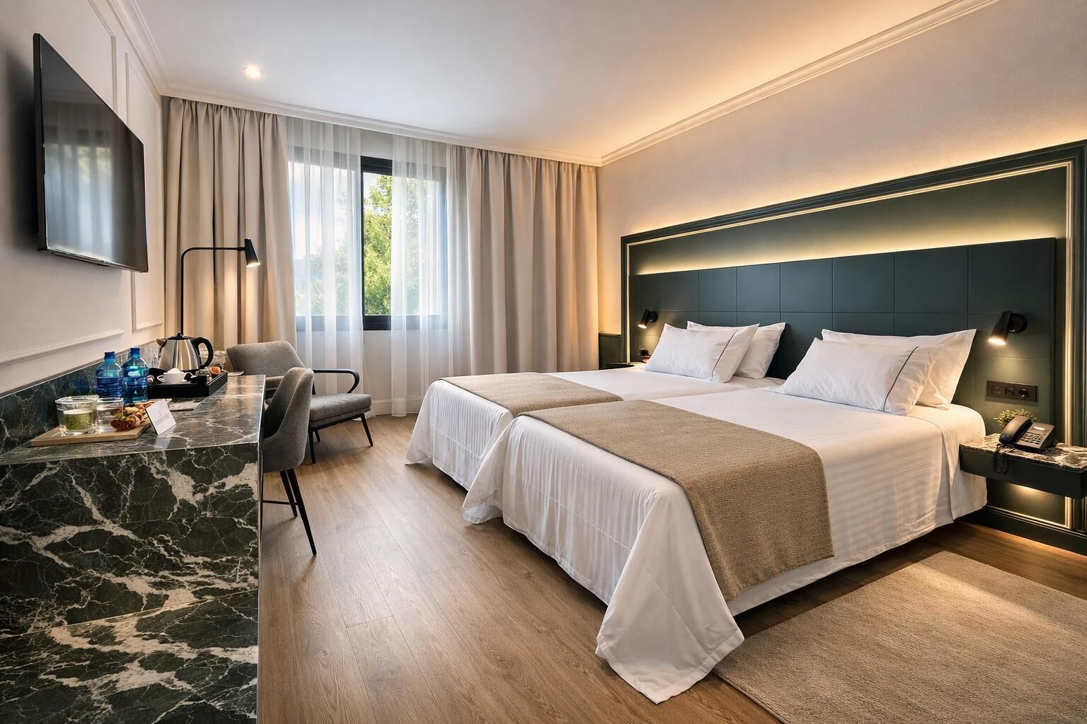 Deluxe Room, Garden View | Minibar, desk, laptop workspace, iron/ironing board