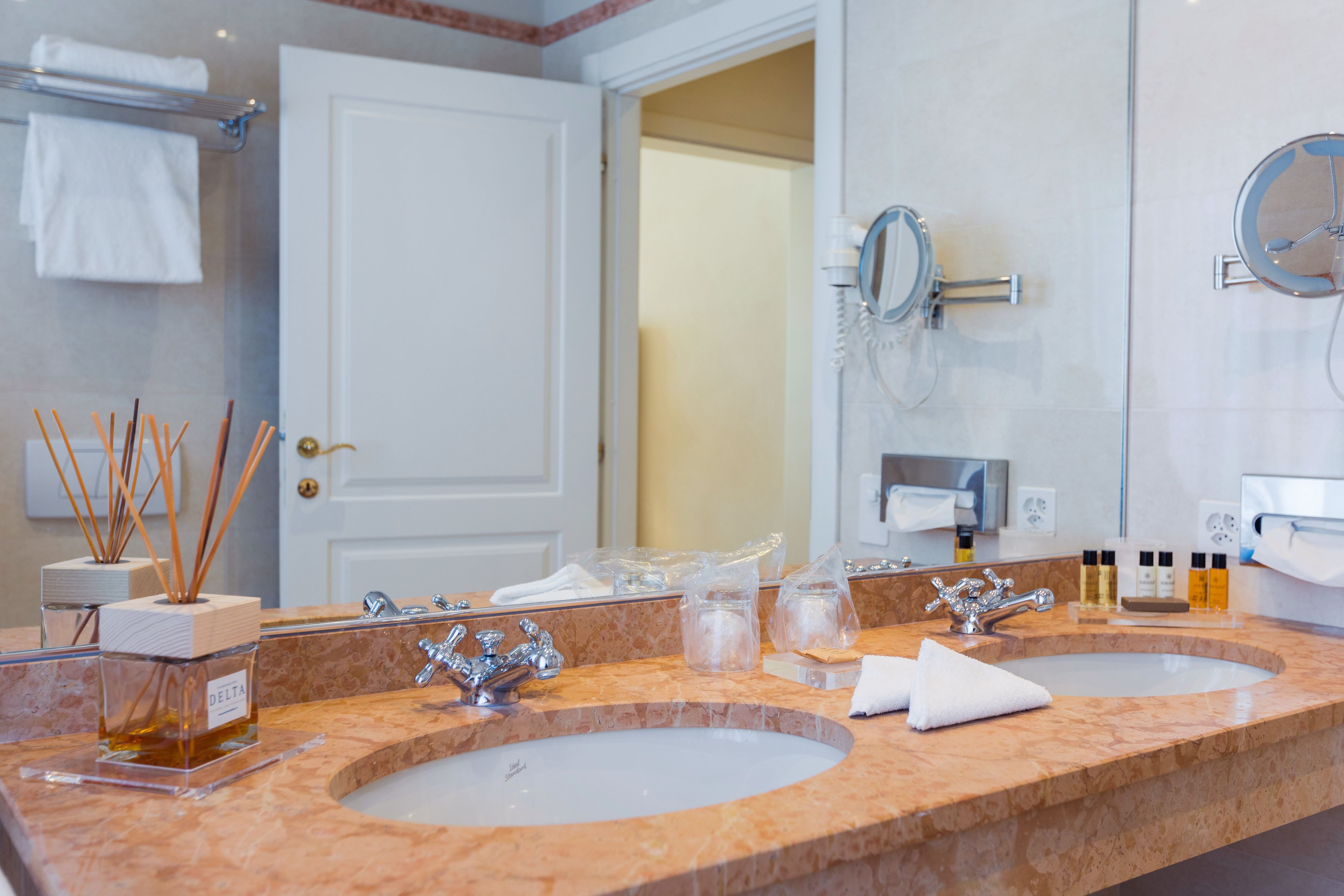 combined shower/bathtub, deep-soaking bathtub, designer toiletries