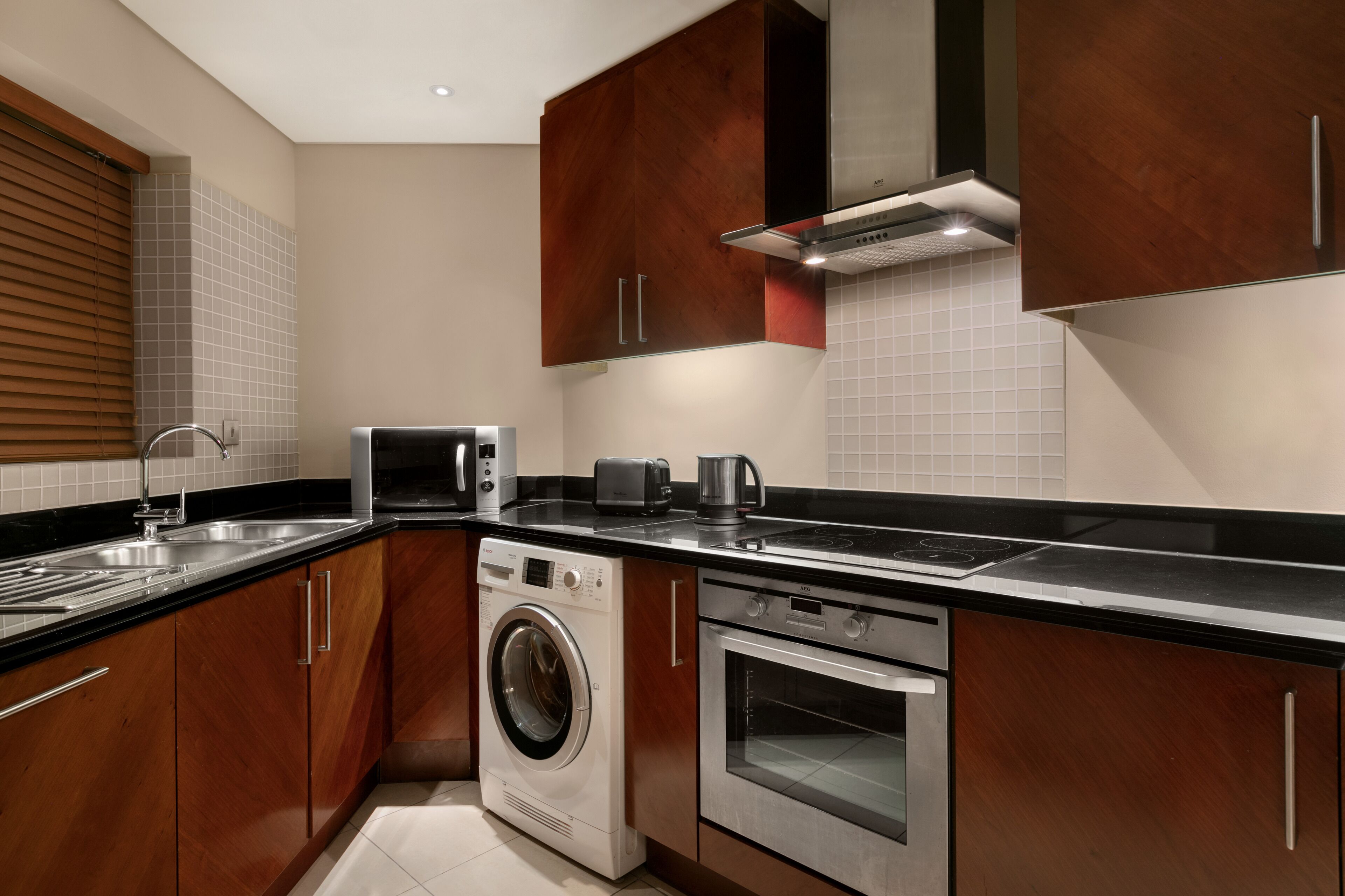 apartment, 2 bedrooms | private kitchen | full-sized fridge, microwave, stovetop, coffee/tea maker