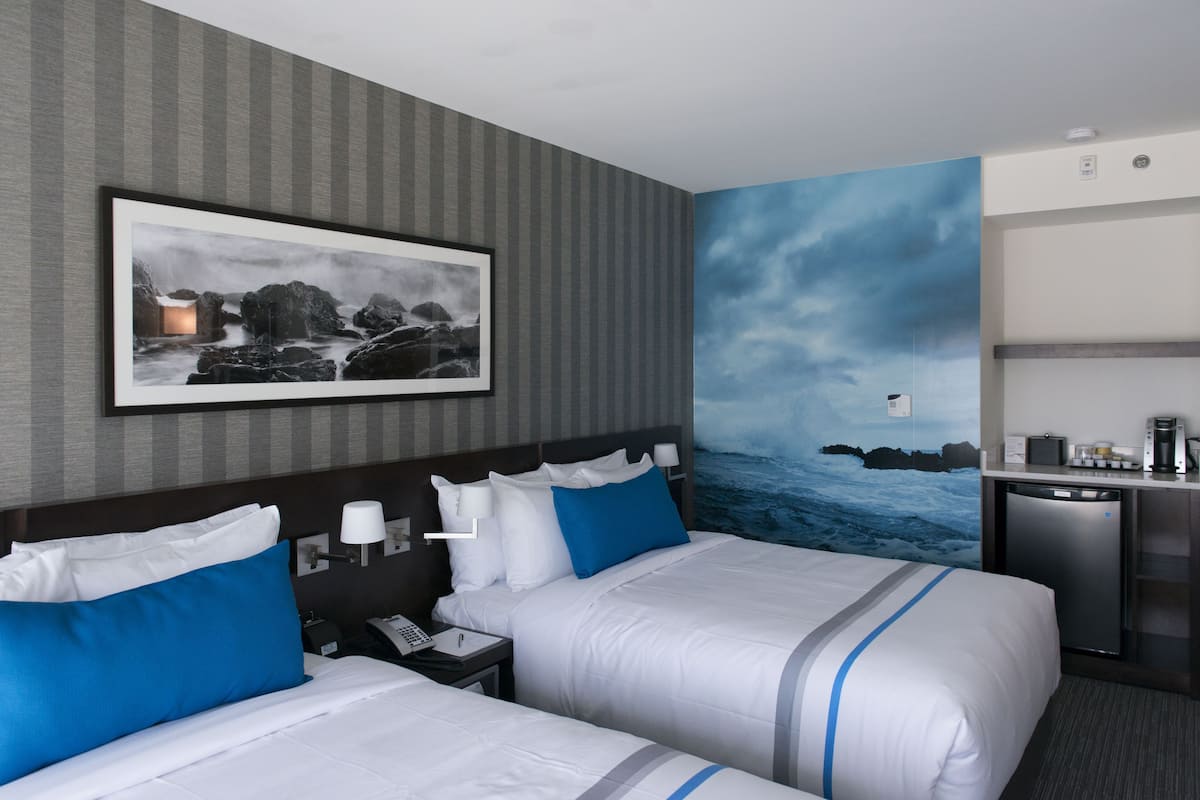 deluxe room, 2 queen beds | premium bedding, pillow-top beds, in-room safe, desk