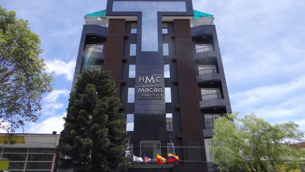 A modern hotel building with a prominent 'HMC Hotel Macao Colombo' sign. - Hotel Macao Colombia (Bogotá)
