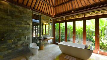 Separate bathtub and shower, hair dryer, bathrobes, slippers