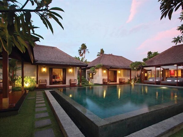 Indoor pool, outdoor pool, pool umbrellas, pool loungers